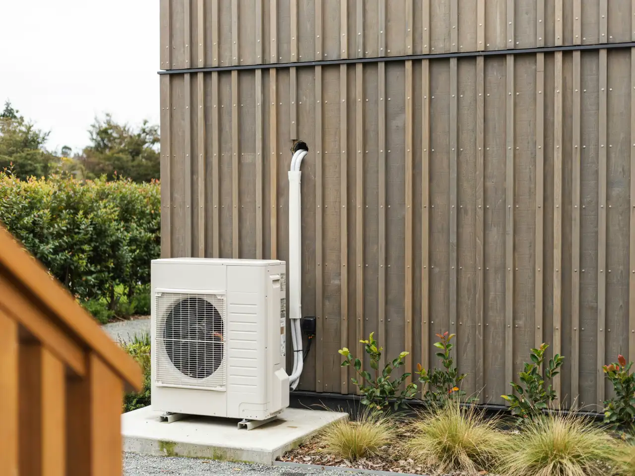 Heat pump outdoor unit on a Waikato home